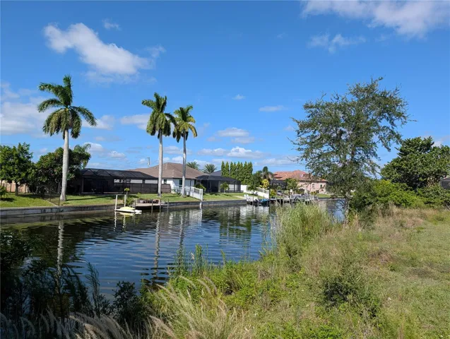 Water access on this vacant, mowed lot on wide canal. Electric and public sewer available. Beautiful location on quiet street.