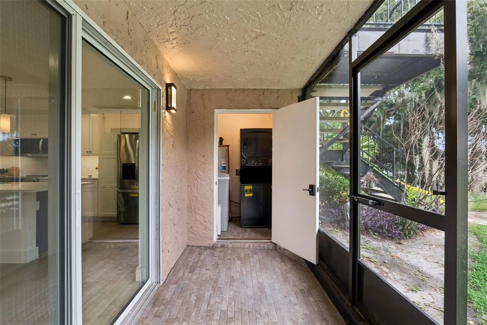 Covered &amp; Screened patio with utility closet