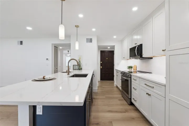 Kitchen with oversized bar for dining &amp; entertaining