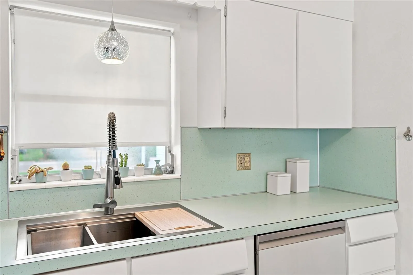 New sink and dishwasher. Original trim in the kitchen.
