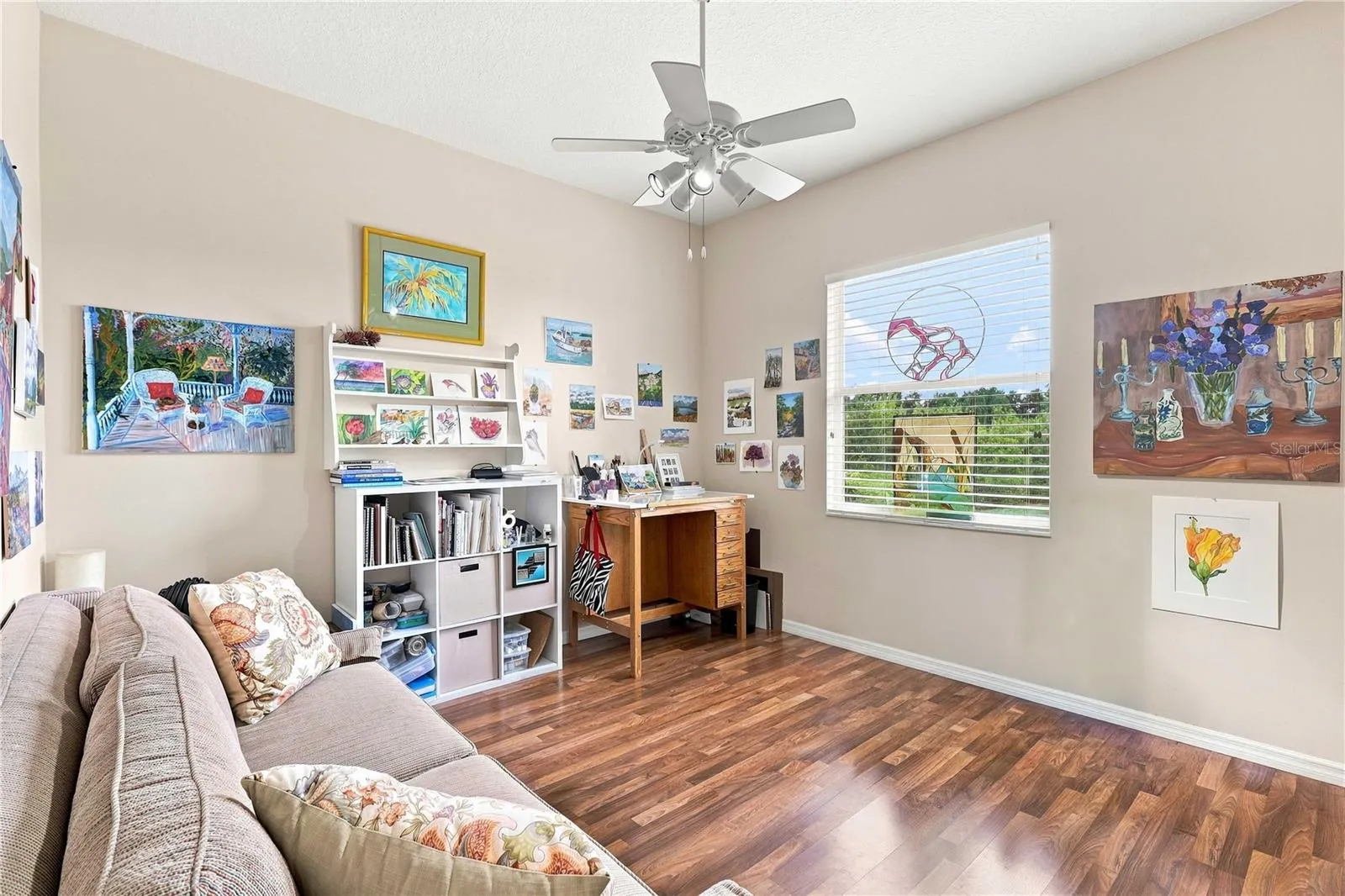 Versatile third bedroom currently used as an art studio