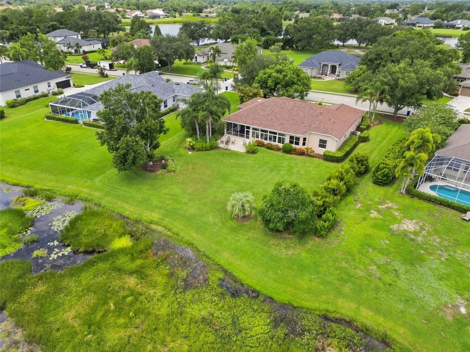 Expansive homesite of nearly half an acre with a spacious backyard, peaceful natural views and plenty of room for a pool