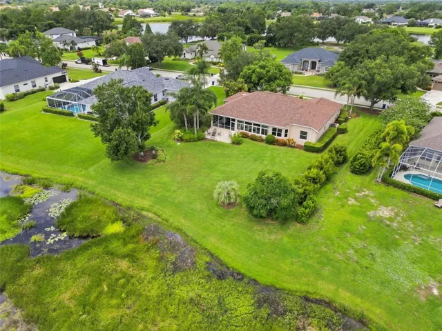 Expansive homesite of nearly half an acre with a spacious backyard, peaceful natural views and plenty of room for a pool