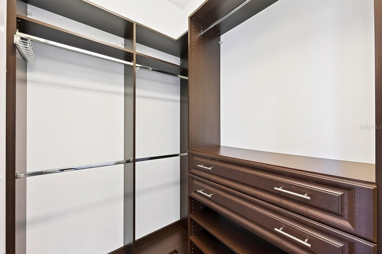 Custom storage in the dual walk-in closets.