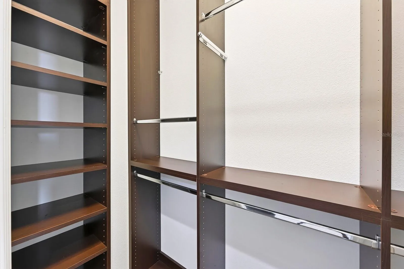 Custom storage in the dual walk-in closets.