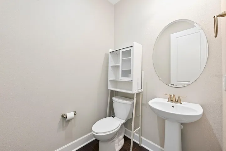 Main floor powder room for guests.