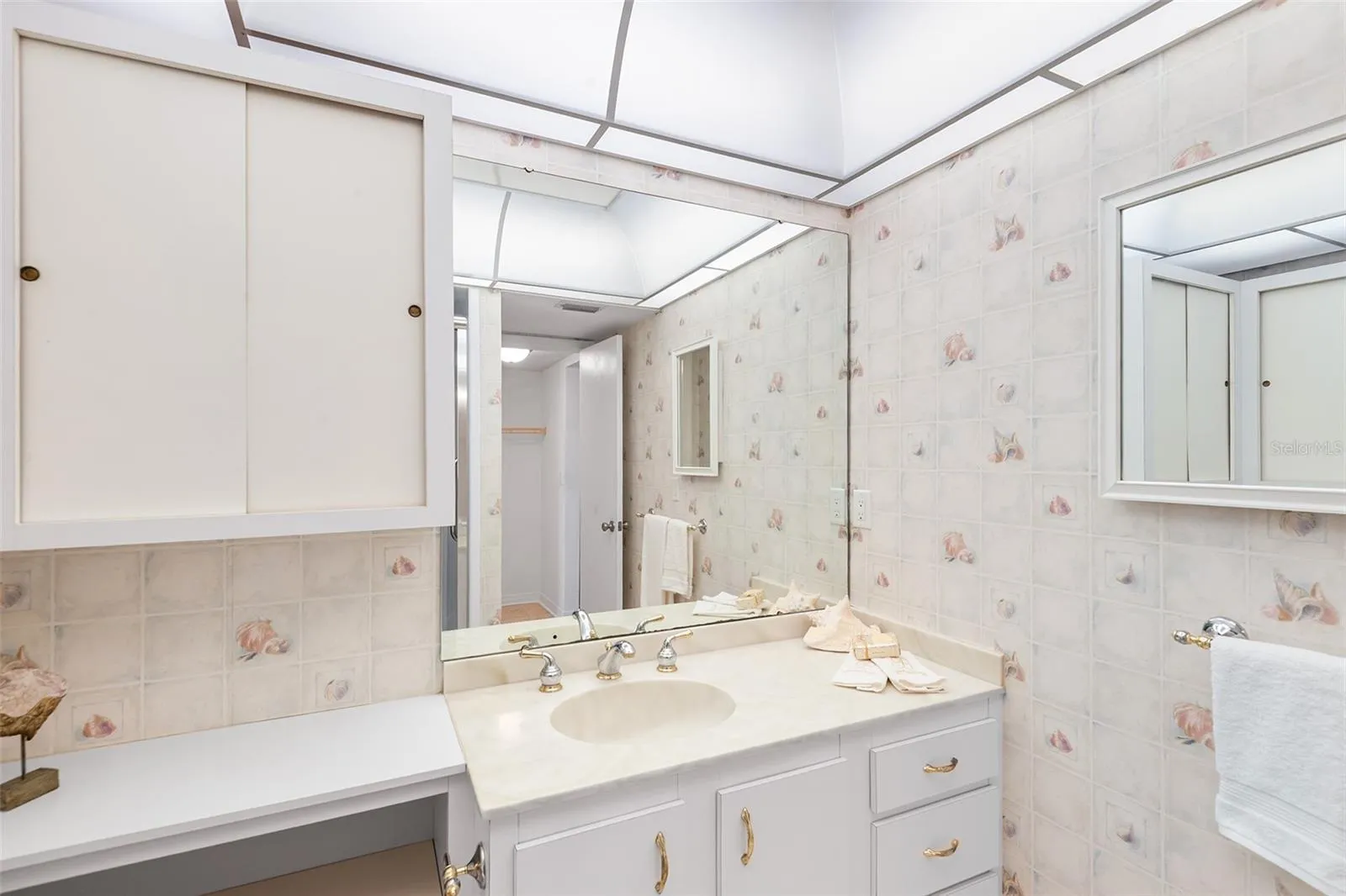 Primary bathroom with plenty of cabinets