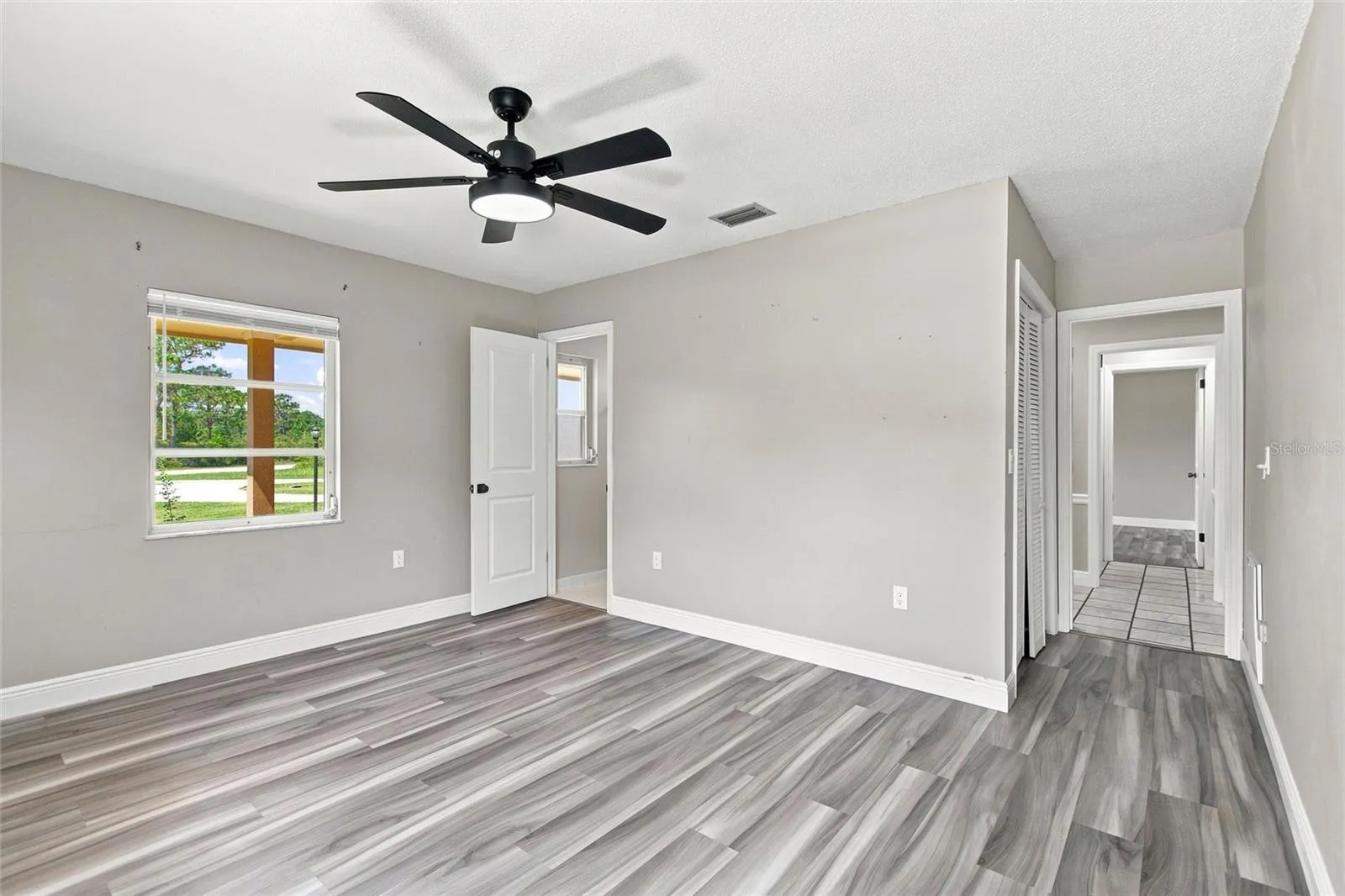 One of two bedrooms located off of the foyer area.  This bedroom has a private ensuite.