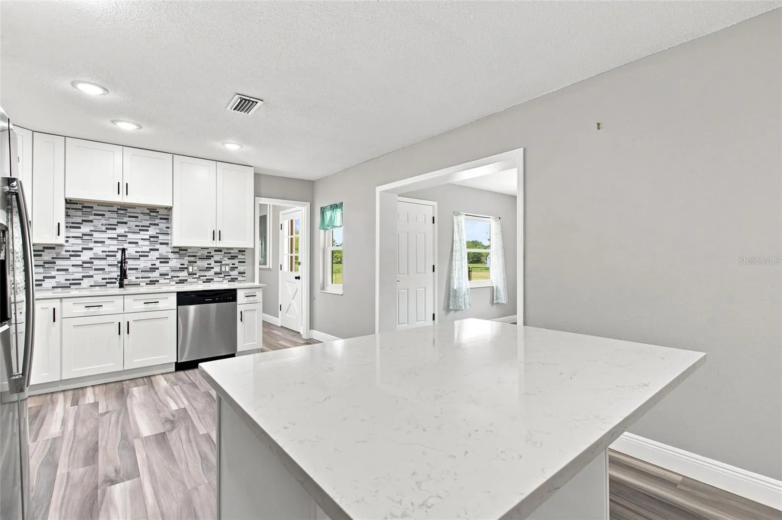 View of kitchen and dining room.