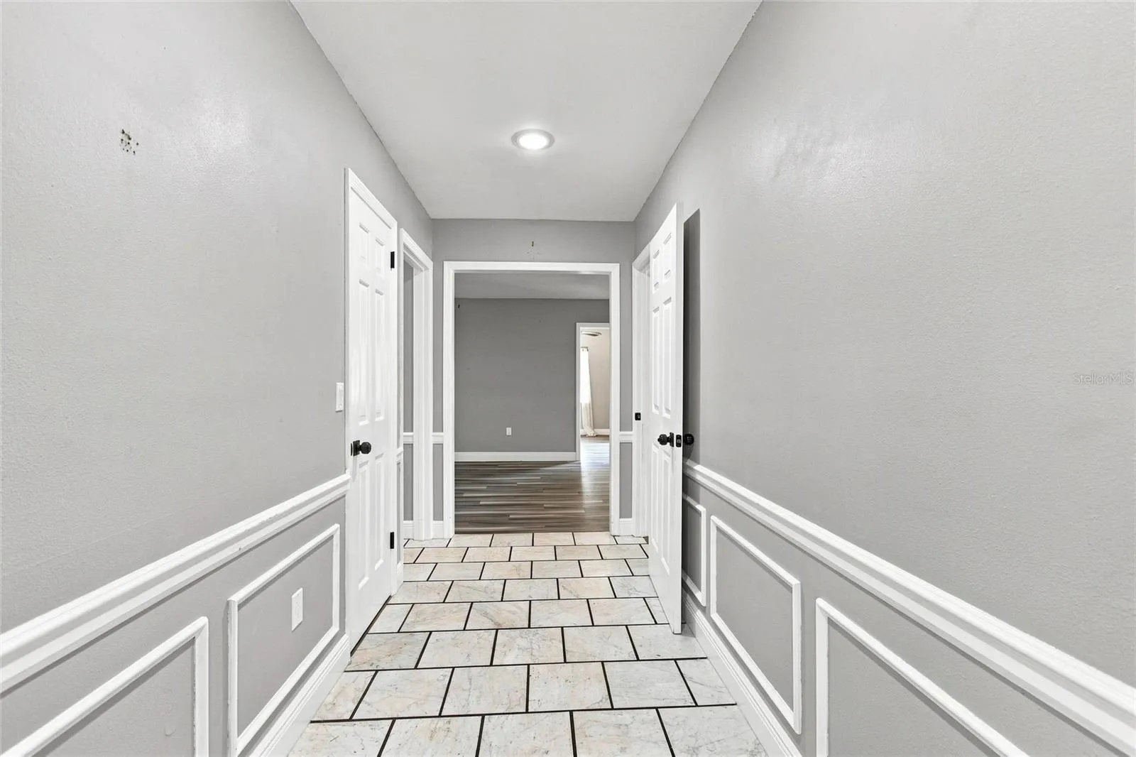 View from the front door entrance.  Expansive foyer area looking into the living area.