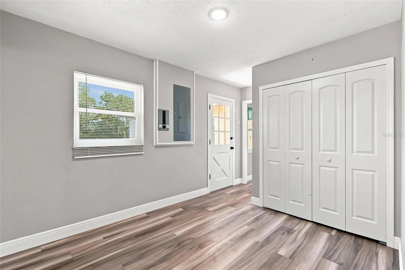 View as you come in from the garage.  The closet to the right houses the washer &amp; dryer.