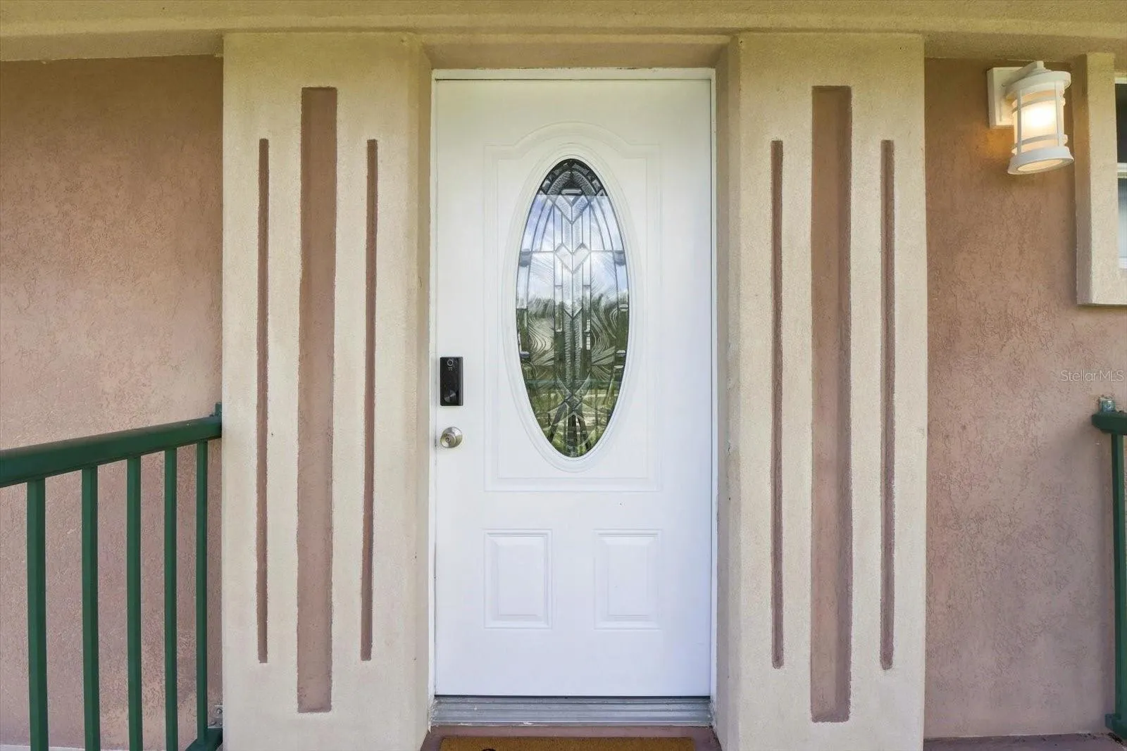 Covered front entry to the main residence.