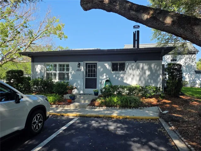 Back Entrance w Parking spot in front