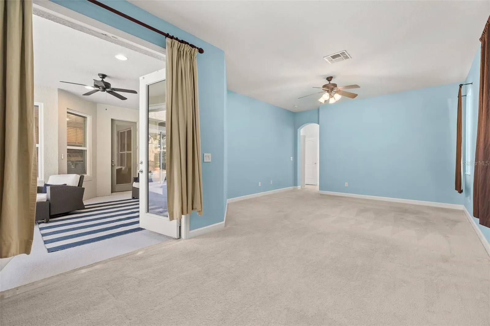 Primary suite with private French doors entrance to the back patio