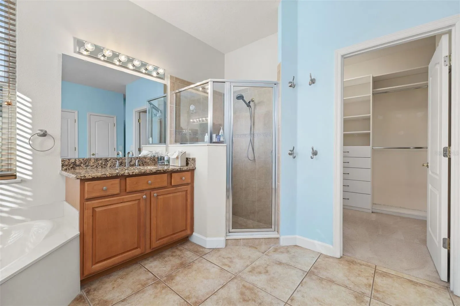 Walk-in shower, plus vanity #2 near closet #2
