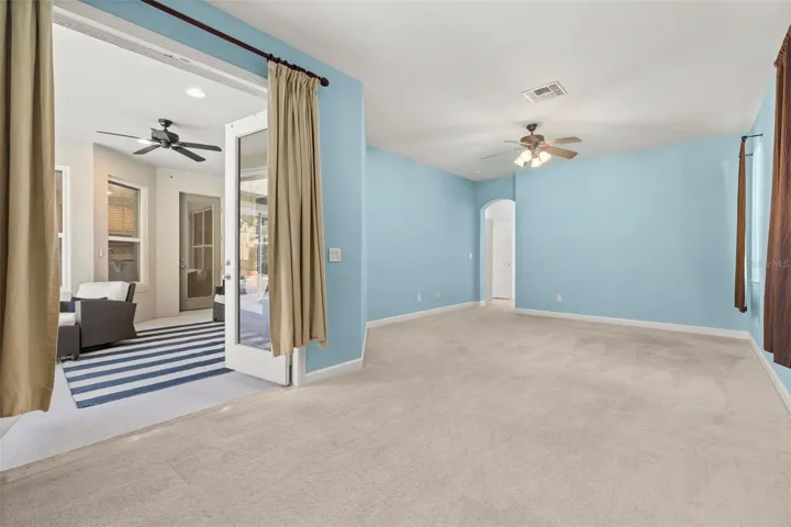 Primary suite with private French doors entrance to the back patio