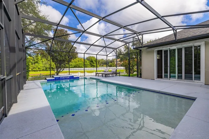 More access to the outdoor living by way of sliding glass doors from the family room