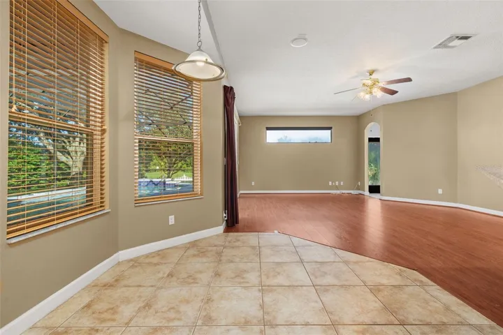 Casual dining space overlooking the pool