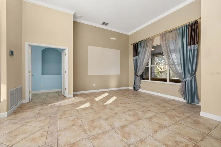 Primary suite entrance off of the formal living space