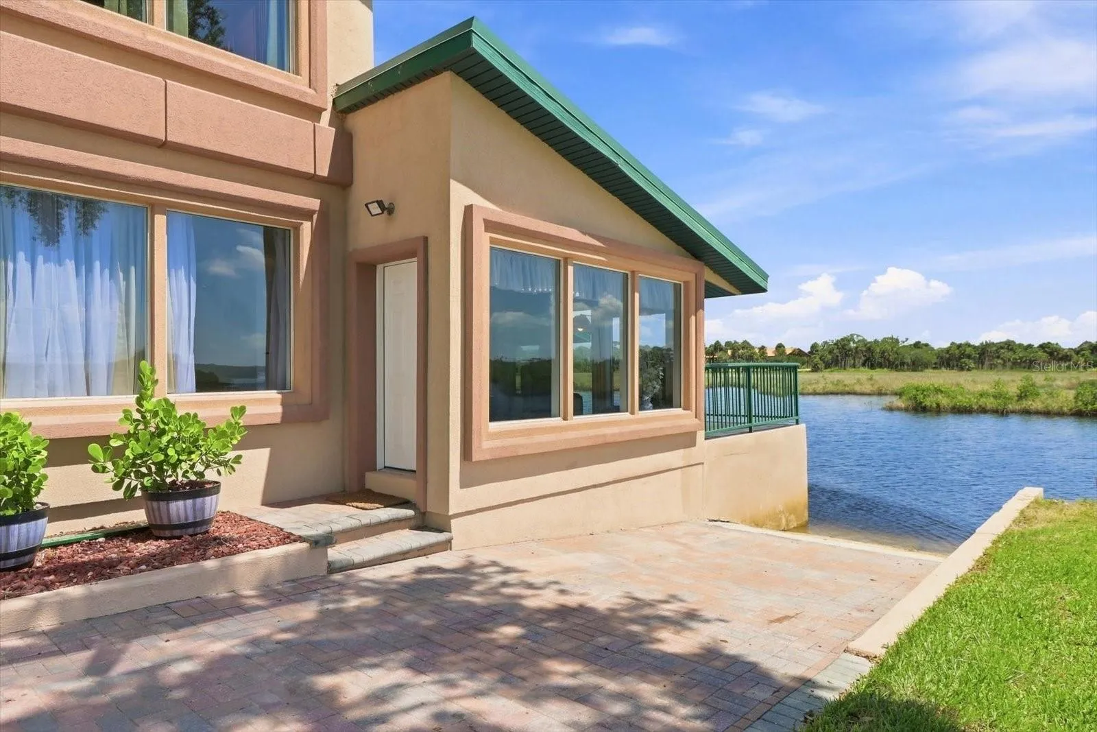 Waterside Exterior – Enclosed Waterfront Living Area