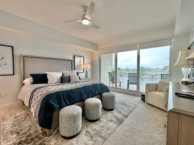 Primary bedroom with balcony access