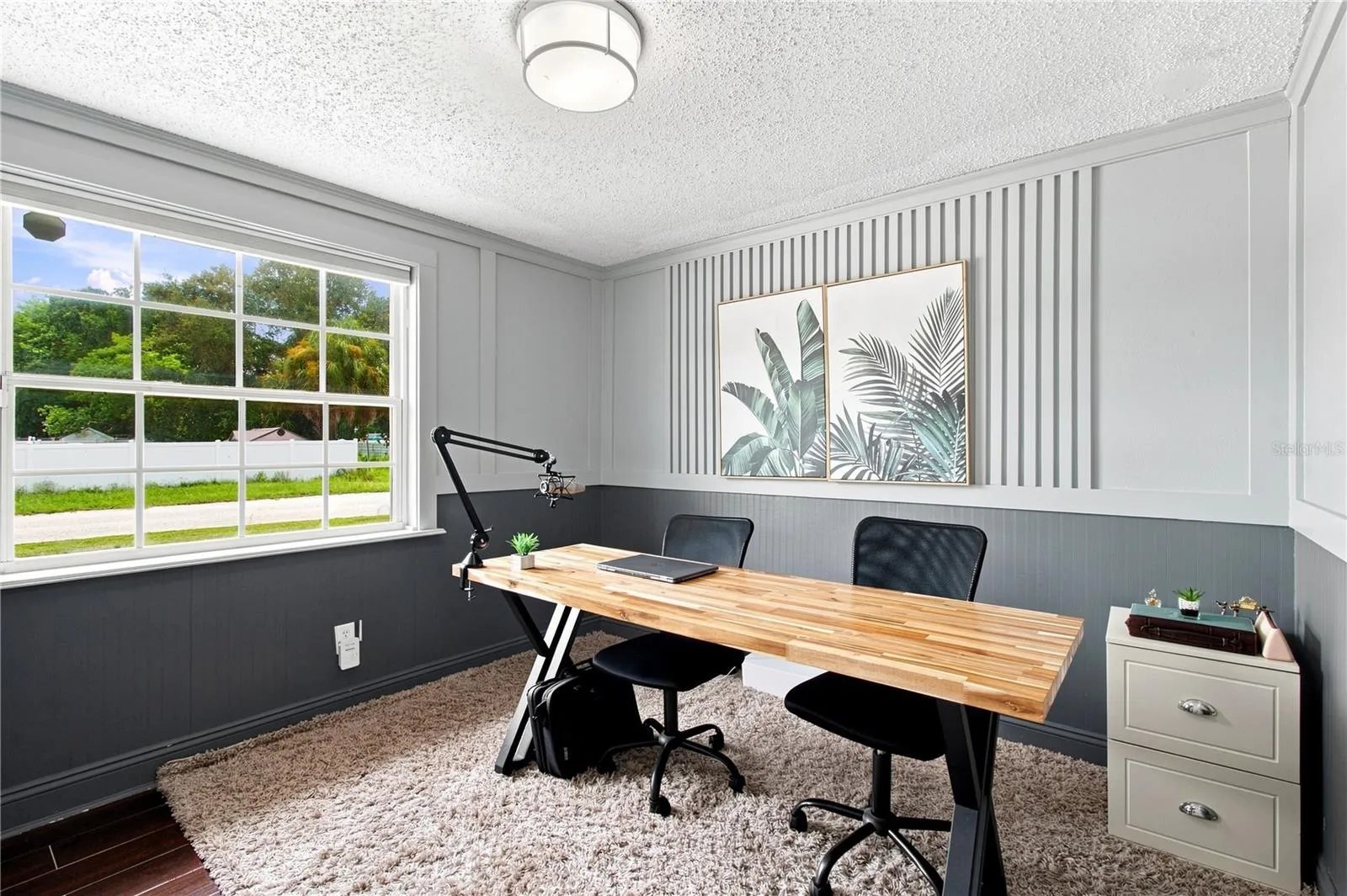 Bedroom #2 Wainscotting and beadboard wood wall designs elevates this room