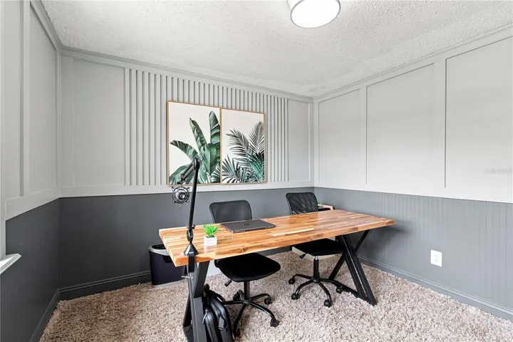 Bedroom #2 Wainscotting and beadboard wood wall designs elevates this room