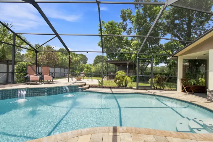 Sparkling pool with water cascade feature
