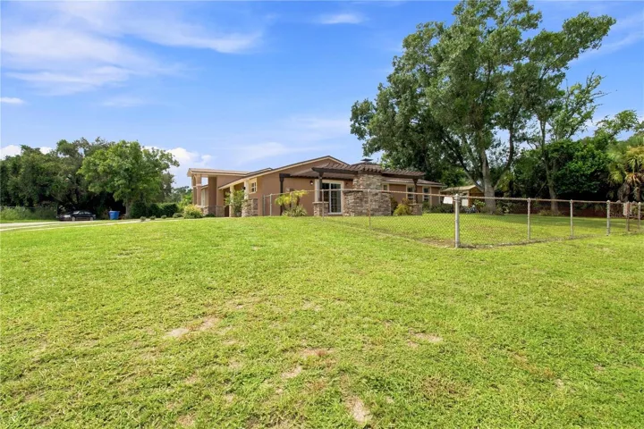 Large corner fenced lot