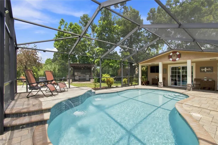Sparkling pool with water cascade feature