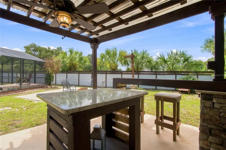 an open-air poolside BBQ cabana