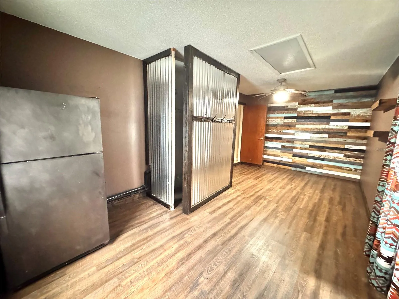 This is not only a mud room or side entry, it houses the AC