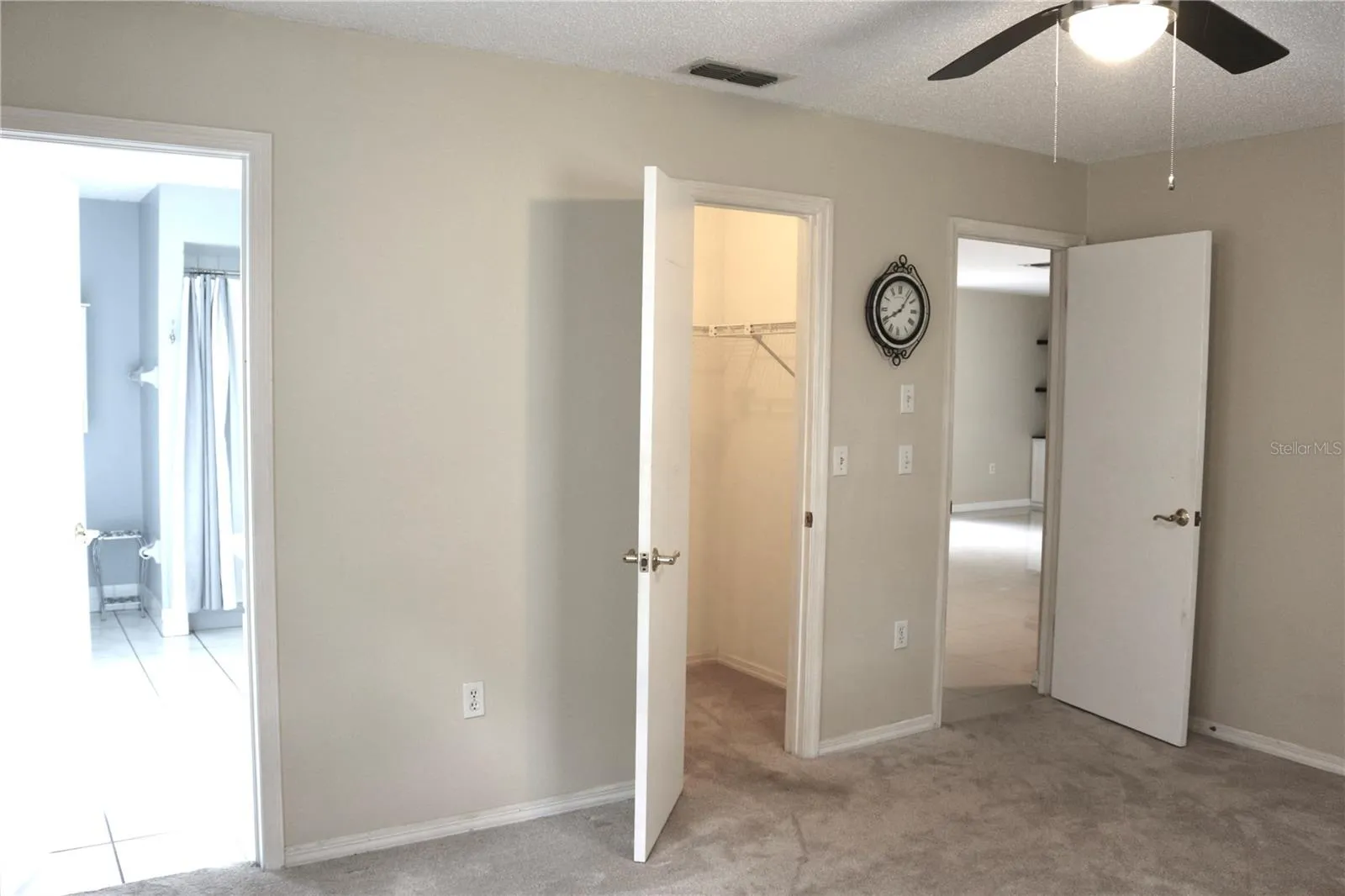 The primary bedroom has a generous walk in closet and an attached bathroom
