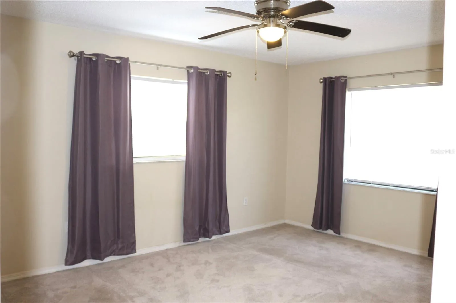 Spacious primary bedroom with attached bath