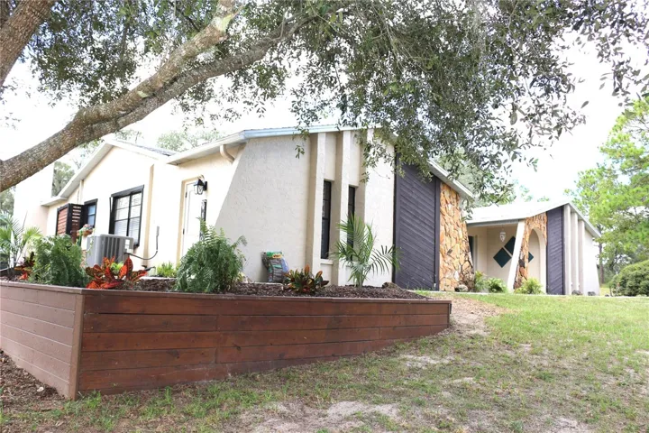 Nicely landscaped gardens and deck
