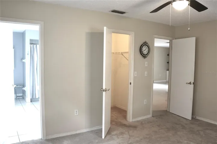 The primary bedroom has a generous walk in closet and an attached bathroom