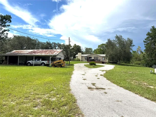 Long driveway to the home