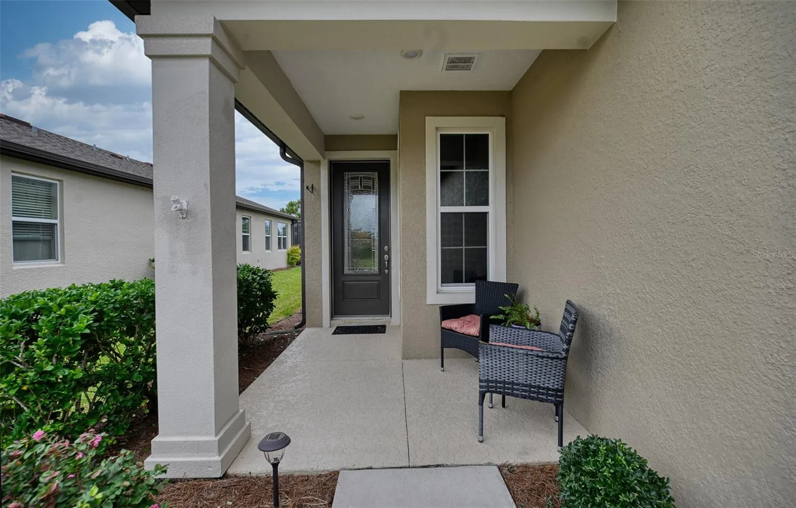 Front Entryway with Covered Porch &amp; Front Door with Glass Insert