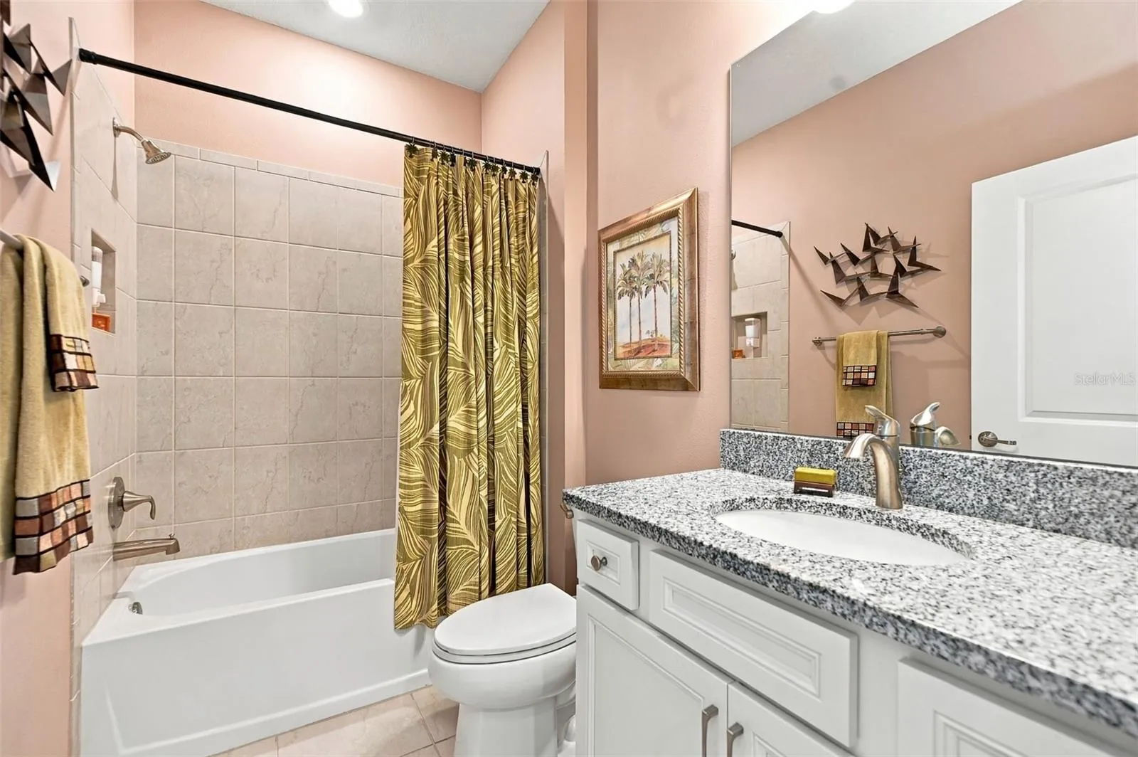 Guest Bath w/tiled shower &amp; tub combo &amp; granite topped single vanity