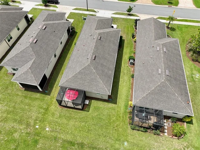 Aerial view from rear of home (red umbrella visible in screened cage)