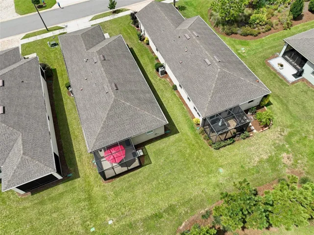 Aerial view from rear of home (red umbrella visible in screened cage)