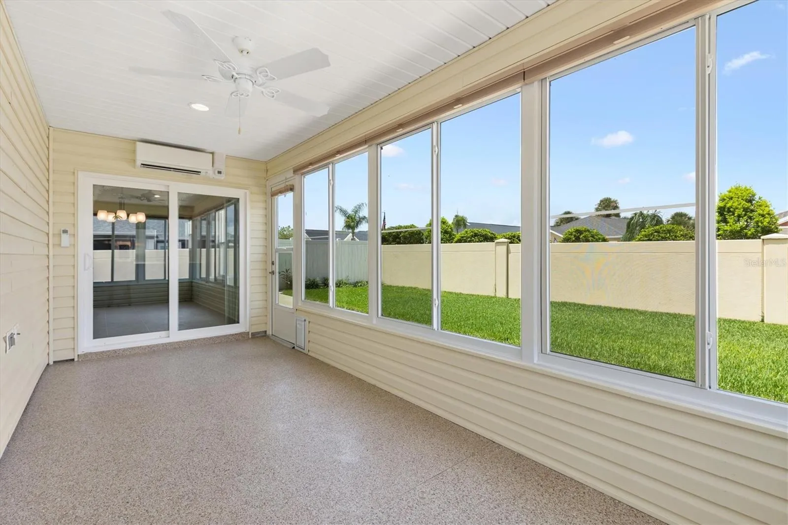 Room enclosed after purchase with windows and doggie door