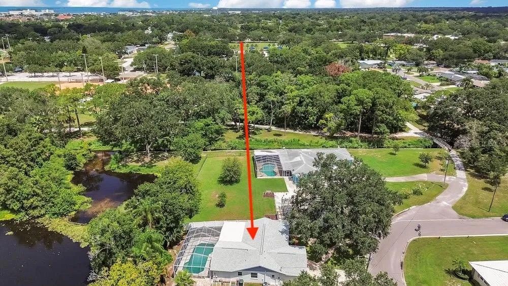 Trail to the right of the arrow goes to the parks