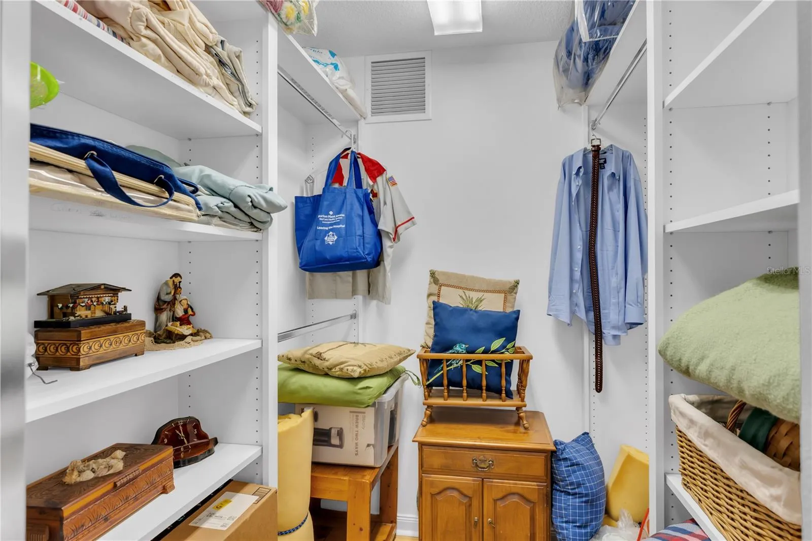 Another large walk-in closet w/ organizers