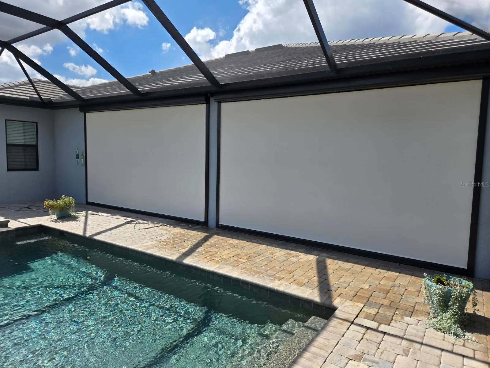 Automatic SPF hurricane screens