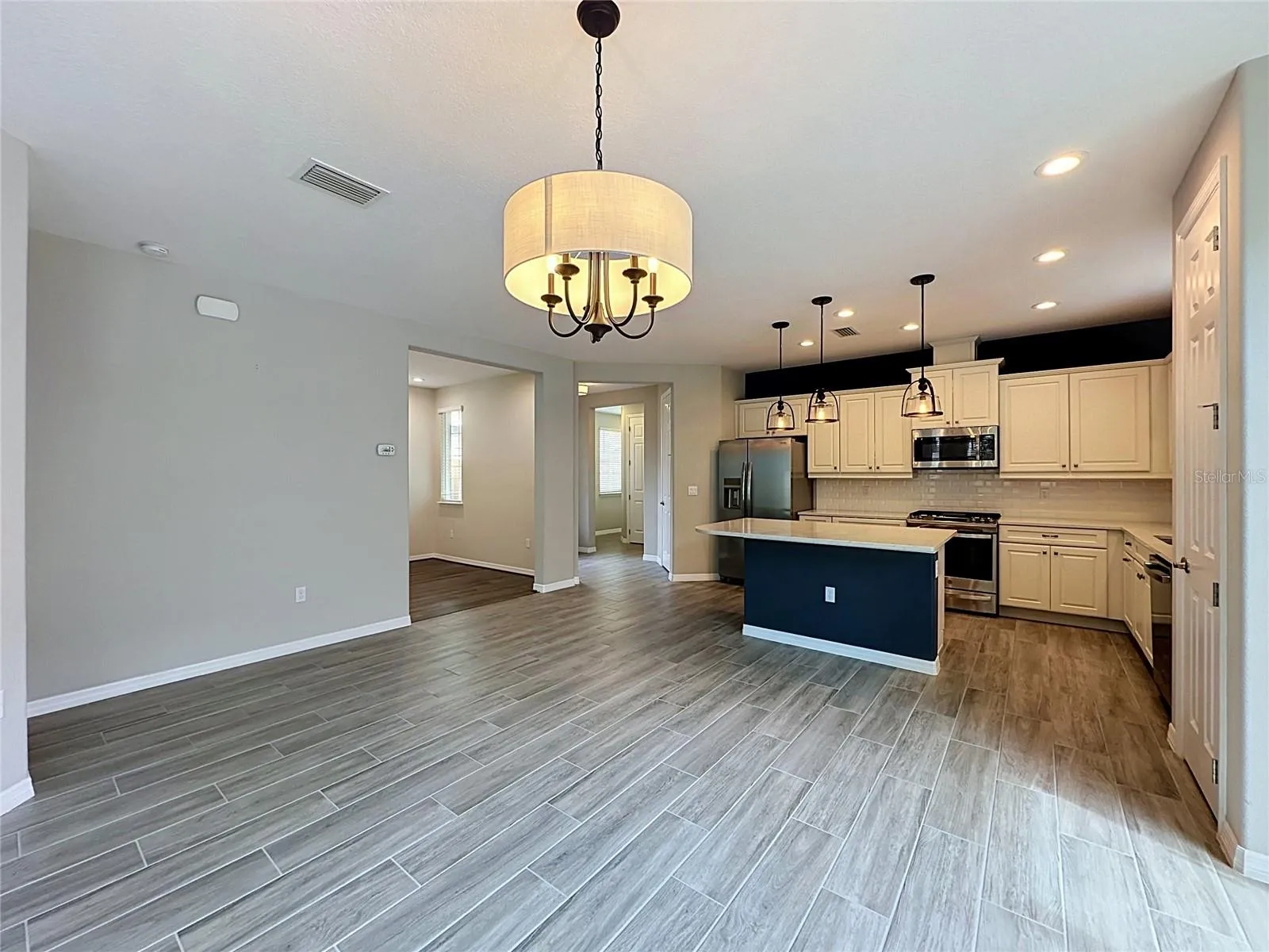View from LIVING ROOM, Den is on the left and side entrance