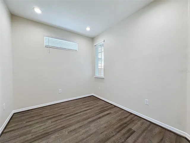 OPTIONAL WALL MAKES THE DEN IDEAL FOR MULTIPLE USES
