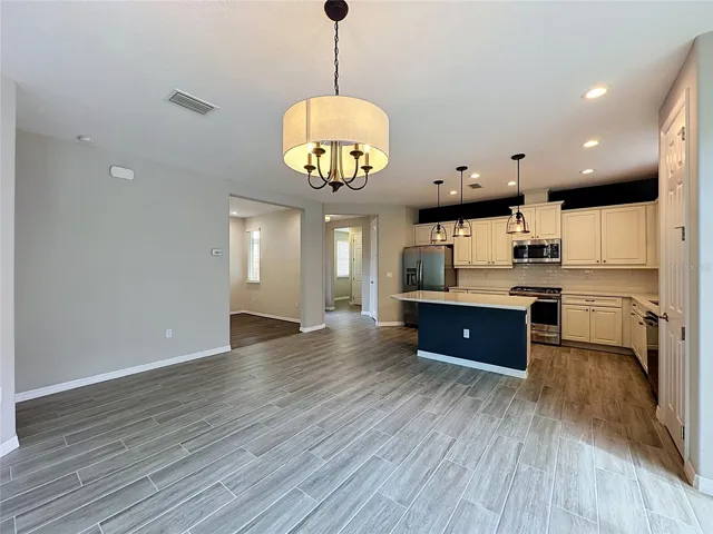 View from LIVING ROOM, Den is on the left and side entrance