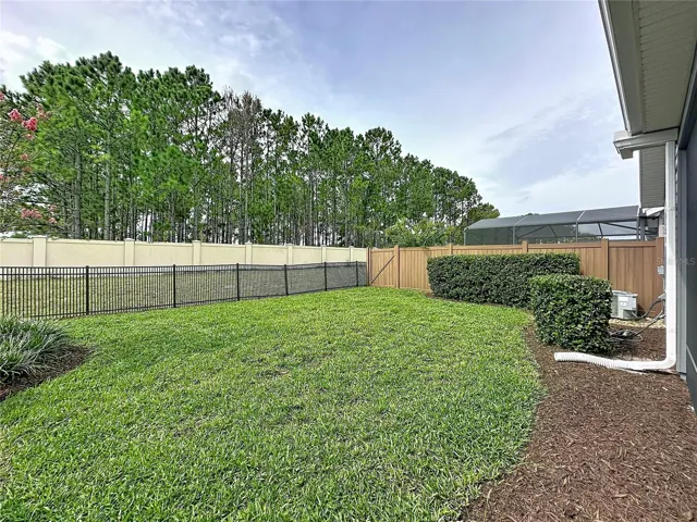 FENCED AND SPACIOUS BACKYARD IS PERFECT FOR YOUR FUR BABIES