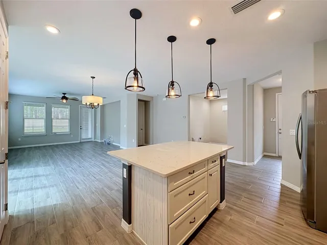 View from kitchen to dining/living combo
